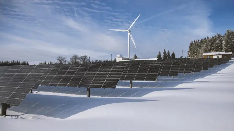 solar panels and wind turbine winter